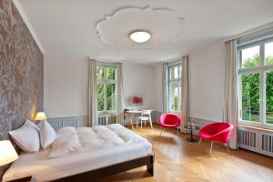 Letto o letti in una camera di Boutique-Hotel Auberge Langenthal