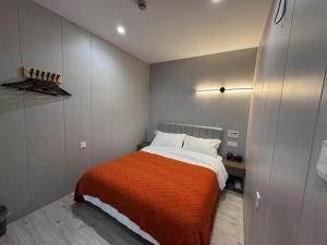 Katil atau katil-katil dalam bilik di KeTangJian Aparthotel