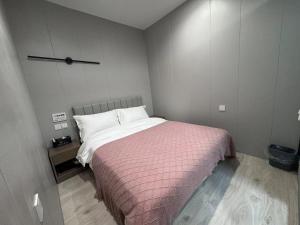 Katil atau katil-katil dalam bilik di KeTangJian Aparthotel