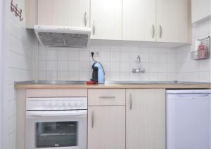 A kitchen or kitchenette at RNET - RHC 3603 Roses Holiday Center