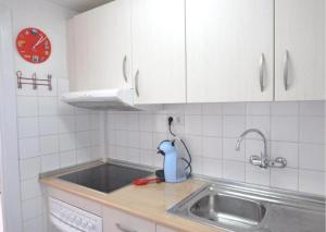 A kitchen or kitchenette at RNET - RHC 3603 Roses Holiday Center