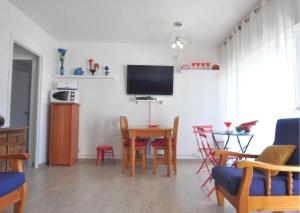 A television and/or entertainment centre at RNET - RHC 3603 Roses Holiday Center