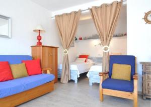 A bed or beds in a room at RNET - RHC 3603 Roses Holiday Center Még 23 kép