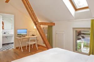 Letto o letti in una camera di Boutique-Hotel Auberge Langenthal