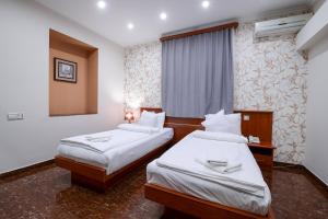 Postel nebo postele na pokoji v ubytování Mia Casa Hotel Yerevan