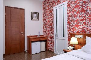 Postel nebo postele na pokoji v ubytování Mia Casa Hotel Yerevan