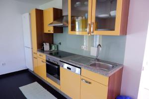 Kuchyň nebo kuchyňský kout v ubytování Casa da Loja Gerês