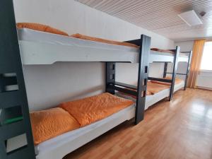 Postel nebo postele na pokoji v ubytování Jugendhotel Eissee