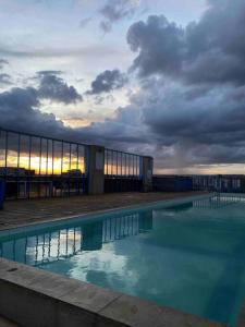 Bazén v ubytování Stylish Studio with Pool nebo v jeho okolí
