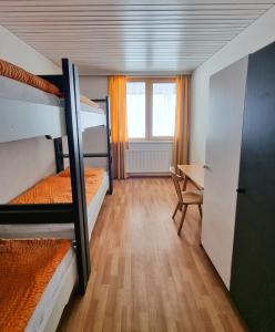 Postel nebo postele na pokoji v ubytování Jugendhotel Eissee
