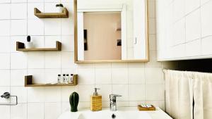 a bathroom with a sink and a mirror at The Dream in Massa Lubrense