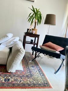 Posezení v ubytování Suite con giardino Ravenna