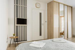 Postel nebo postele na pokoji v ubytování BALANCE apartments