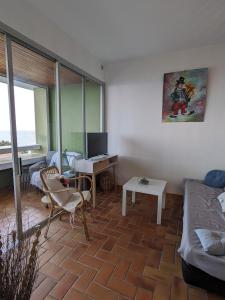 Area soggiorno di Solenzara charmant appartement vue mer panoramique