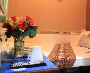 Uma cama ou camas num quarto em Payless A2 Guest House