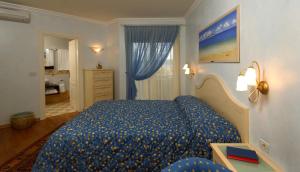 Posteľ alebo postele v izbe v ubytovaní Skiper Apartments & Golf Resort