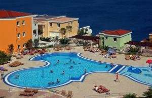 Bazén v ubytovaní Skiper Apartments & Golf Resort alebo v jeho blízkosti