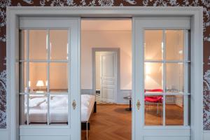 Letto o letti in una camera di Boutique-Hotel Auberge Langenthal