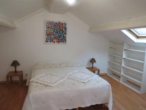 Postel nebo postele na pokoji v ubytování ApartHotel François 1er 14eme