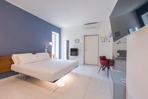 Postel nebo postele na pokoji v ubytování Aquamaris Design Suite & Spa