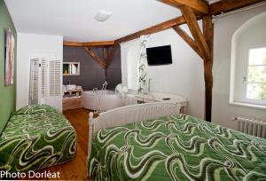Postel nebo postele na pokoji v ubytování Gîte François 1er