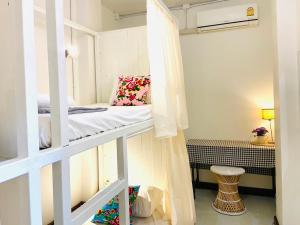 Ein Bett oder Betten in einem Zimmer der Unterkunft Chiza hostel Chiangmai