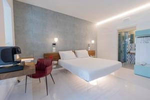 Postel nebo postele na pokoji v ubytování Aquamaris Design Suite & Spa