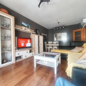 Oleskelutila majoituspaikassa 3 bedrooms apartement with balcony and wifi at Tabernas