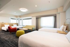 Кровать или кровати в номере Hotel Nikko Kansai Airport - 3 mins walk to the airport