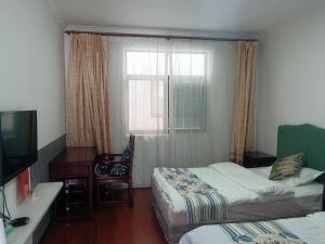 Voodi või voodid majutusasutuse Dali No52 Inn toas