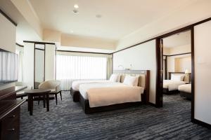 Кровать или кровати в номере Hotel Nikko Kansai Airport - 3 mins walk to the airport