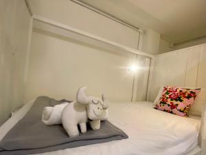 Ein Bett oder Betten in einem Zimmer der Unterkunft Chiza hostel Chiangmai