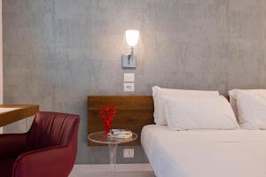 Postel nebo postele na pokoji v ubytování Aquamaris Design Suite & Spa