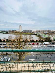 a view of a parking lot with cars in a parking lot at Chez Nata in Rouen