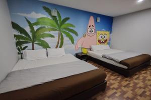 Postel nebo postele na pokoji v ubytování Nova Hotel, Ipoh Tambun