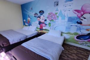 Postel nebo postele na pokoji v ubytování Nova Hotel, Ipoh Tambun