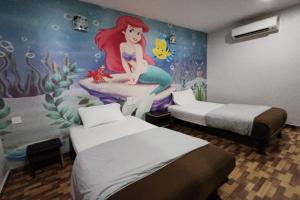 Postel nebo postele na pokoji v ubytování Nova Hotel, Ipoh Tambun