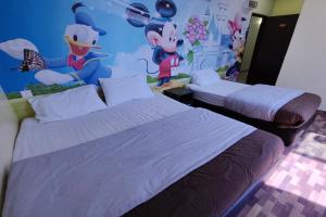 Postel nebo postele na pokoji v ubytování Nova Hotel, Ipoh Tambun