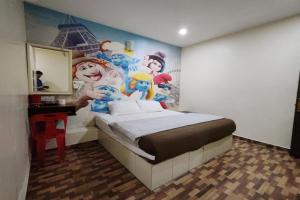 Postel nebo postele na pokoji v ubytování Nova Hotel, Ipoh Tambun