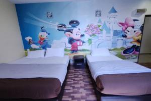 Postel nebo postele na pokoji v ubytování Nova Hotel, Ipoh Tambun