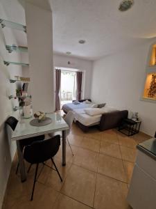 Postel nebo postele na pokoji v ubytování Studio apartman Zana