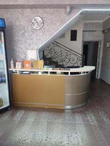 a counter in a store with a stair case at КZO in Shymkent