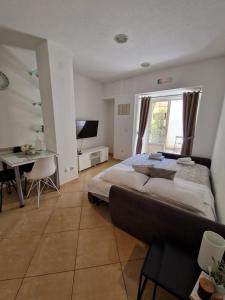 Postel nebo postele na pokoji v ubytování Studio apartman Zana