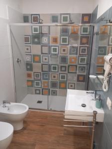 Kúpeľňa v ubytovaní Qvattro stagioni panoramic suites + 37 fotografií