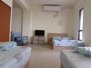 Krevet ili kreveti u jedinici u okviru objekta 南州民宿 NanChou Guesthouse