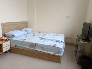 Krevet ili kreveti u jedinici u okviru objekta 南州民宿 NanChou Guesthouse