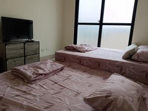 Krevet ili kreveti u jedinici u okviru objekta 南州民宿 NanChou Guesthouse