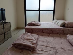 Krevet ili kreveti u jedinici u okviru objekta 南州民宿 NanChou Guesthouse
