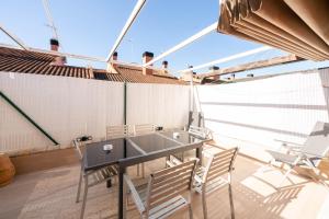 En balkon eller terrasse på Apartamentos Go - Chalet Calera