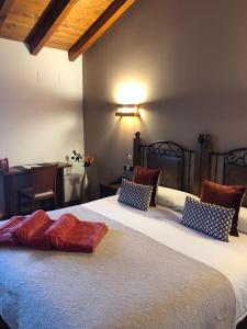 Cama o camas de una habitación en Hotel-Apartamento Rural Atxurra